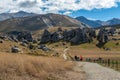 Tourists visiting Castle Hill in Southern Alps, Arthur's Pass, South Island of New Zealand